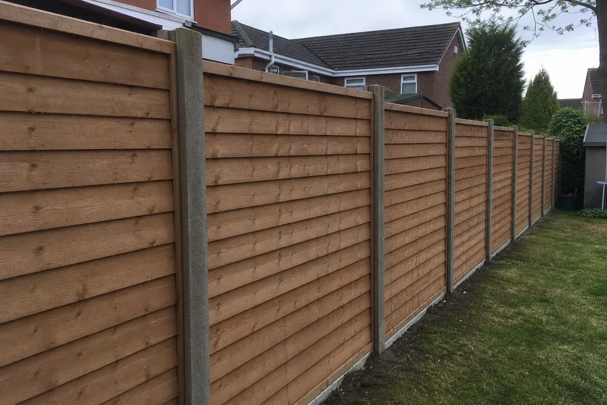 Feather edge timber fencing in a Manchester garden