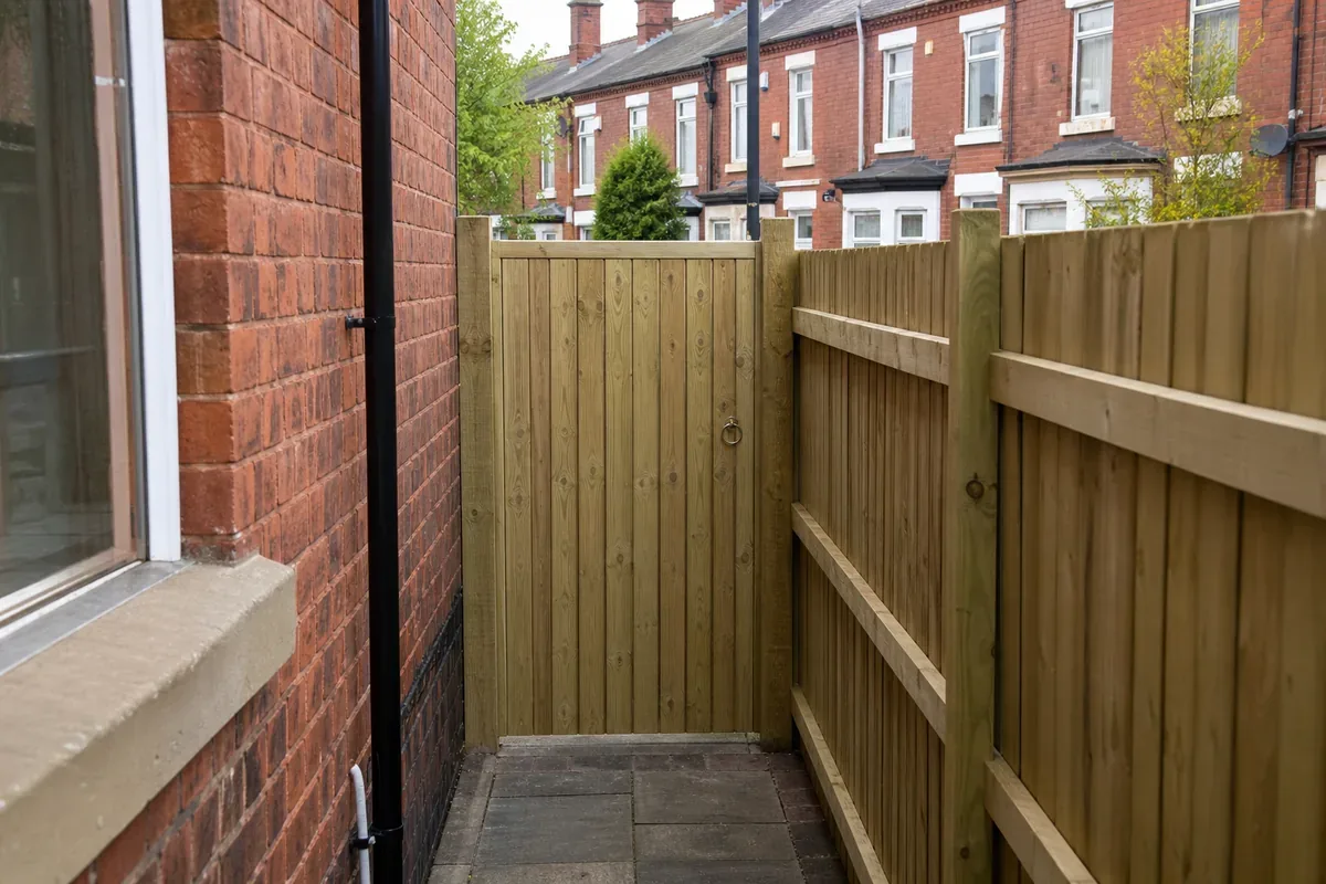 Wooden garden gate fitted in Manchester